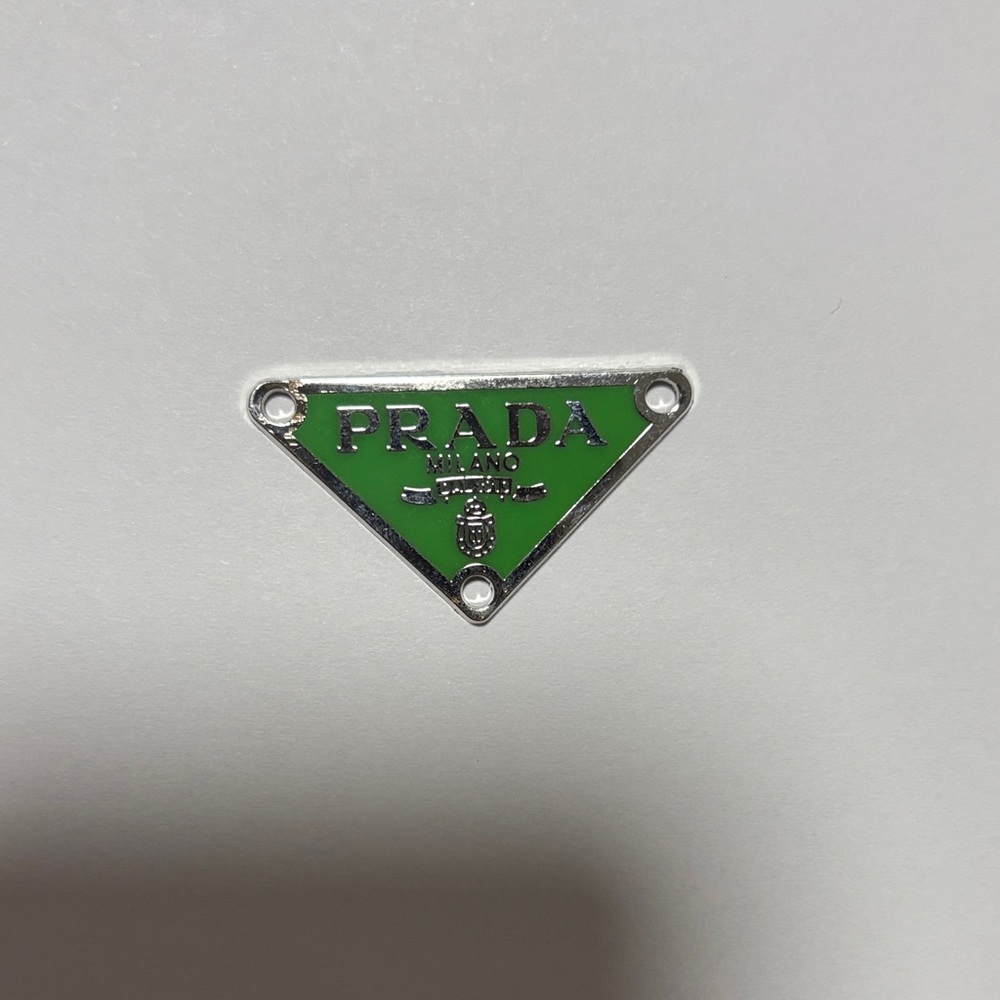 Prada Triangular Green and Silver Emblem Pendant